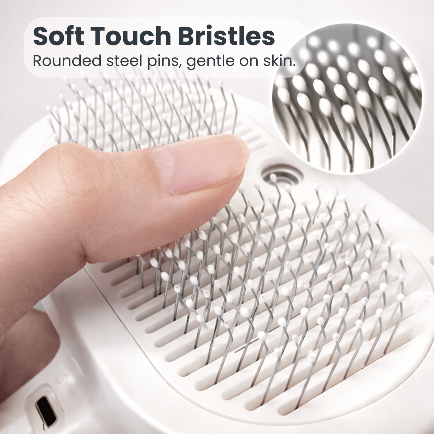 Pet Brush SteamBrush closeup with soft touch bristles and rounded steel pins